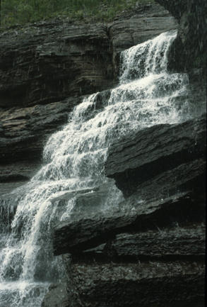 View from under ledge of Upper High Falls  Photograph by Carlton E. Brett